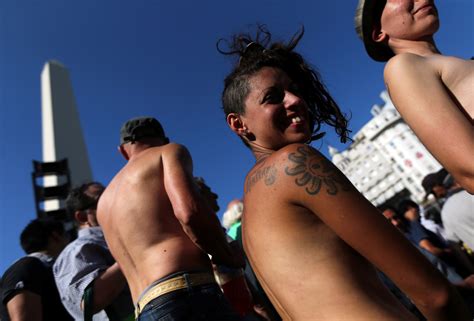 Argentine women stage topless protest claiming sunbathers' rights | Reuters