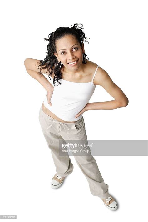 Woman looking at camera, smiling, hands on hip | Figure poses, Human ...