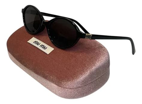 Oculos De Sol Miu Miu Oval Feminino 04zs - Full | Parcelamento sem juros