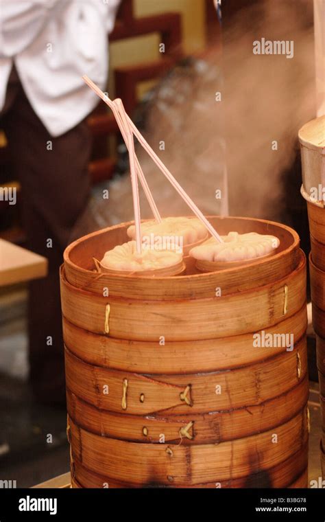 Shanghai dumplings being steamed to perfection Stock Photo - Alamy