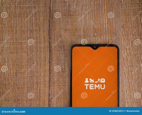 Temu App Launch Screen on Smartphone on Wooden Background Editorial ...