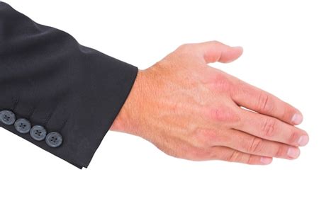 Premium Photo | Businessman holding his hand out