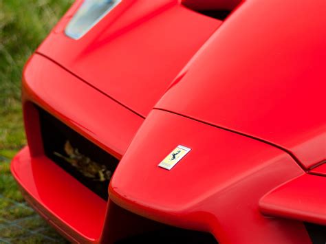 Download wallpaper Ferrari, logo, Ferrari Enzo, Enzo, close-up, badge, section ferrari in ...