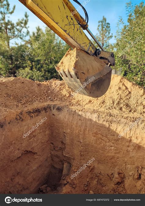 Excavator Digs Foundations Building Digging Pit Foundation Hole ...