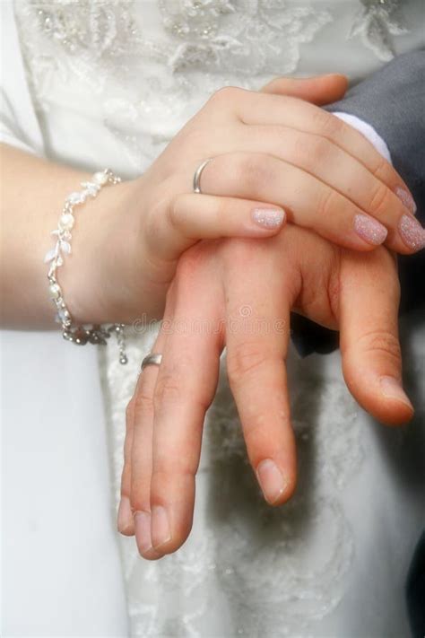 Hands with wedding rings stock photo. Image of candles - 113372346