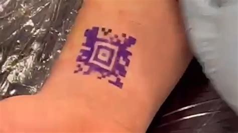 Man inks QR code on his arm to secure supermarket club card benefits