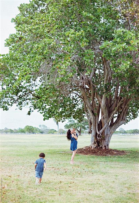 "Mother With Interracial Baby Son" by Stocksy Contributor "Marlon