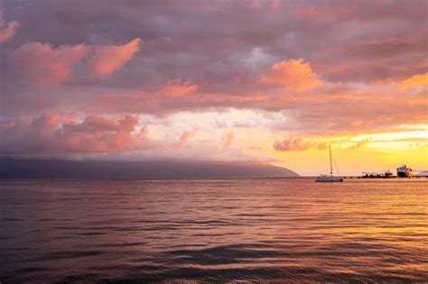 Premium Photo | Sunset view over the bay shot from drone red sky in albania