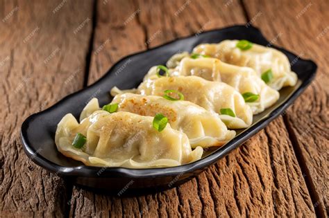 Premium Photo | Gyoza or Jiaozi Traditional Chinese and Japanese food