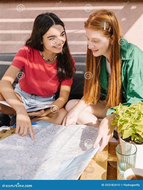 Travel Trip Planning with Friend. Two Young Teenager Girls Planning