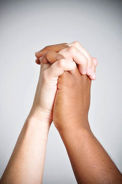interlocked hands stock  pictures royalty  images istock