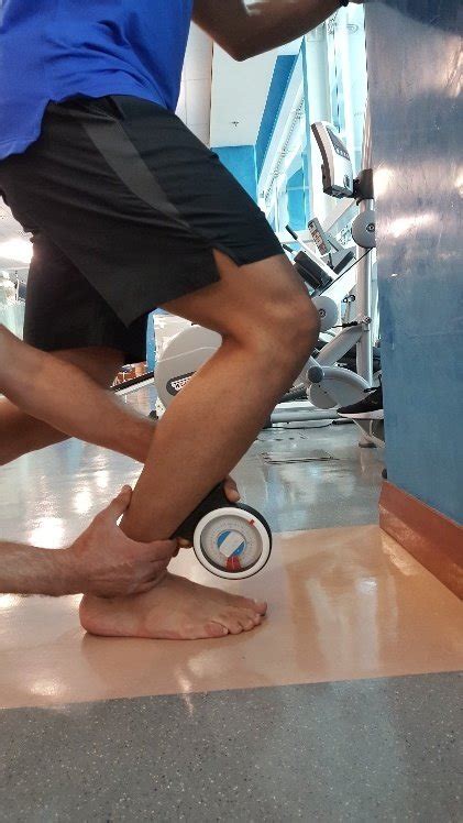 Positioning for dorsiflexion range of motion measurement. Patient was ...