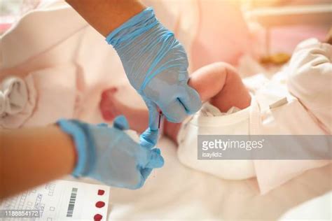 Baby Blood Test Photos and Premium High Res Pictures - Getty Images