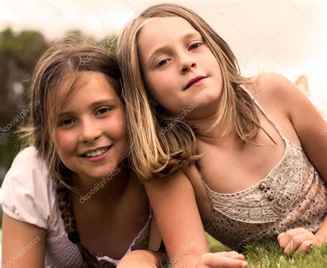 Little sisters — Stock Photo © MarcoGovel #55690003