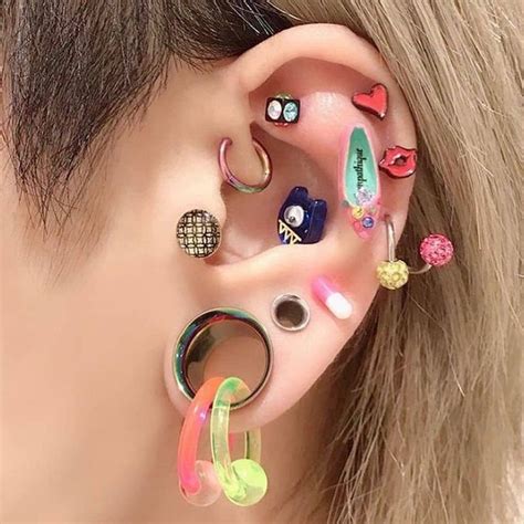 Crazy ear piercings | Colored piercings, Weird ear piercings, Body mods