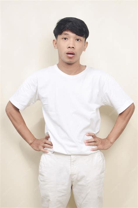 Premium Photo | Shocked and worried asian man reacting to bad news on