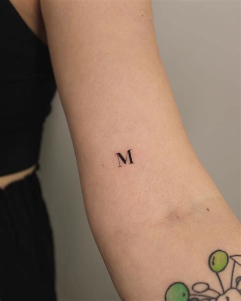m letters tattoo