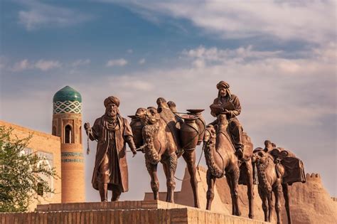 premium photo sculpture  camels carrying goods  silk road