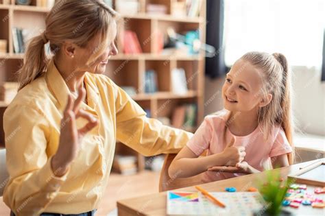 premium photo positive teacher making hand gesture practice nonverbal