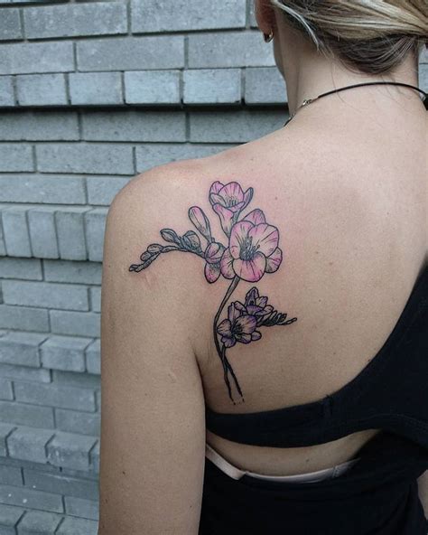 22 Beautiful and Delicate Freesia Tattoo Designs | TattooAdore