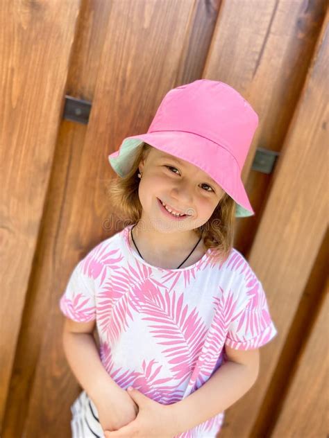 Girl in hat,smiling stock photo. Image of brown, curly - 256259984