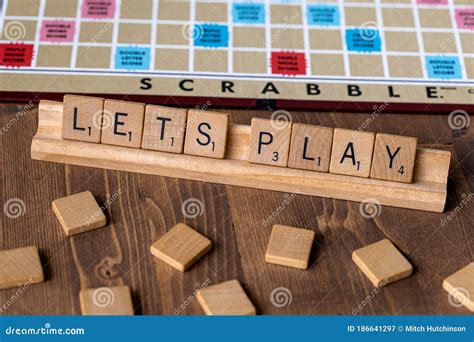 scrabble board game   scrabble tile spell lets play editorial