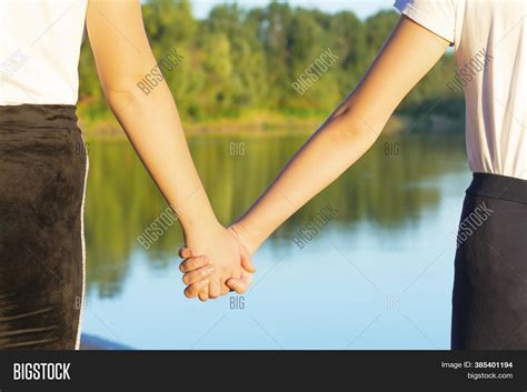 girls  friends holding hands