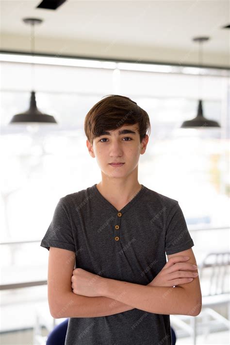 Premium Photo | Young handsome iranian teenage boy relaxing at home