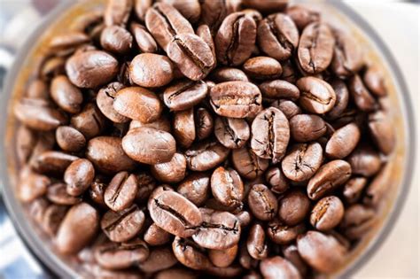 Premium Photo | Fresh roasted blend coffee beans