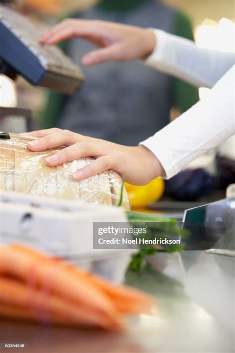 cashier ringing  groceries high res stock photo getty images