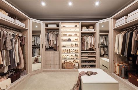 Luxurious Boutique Dressing Room with Open Shelving and Integrated Lights