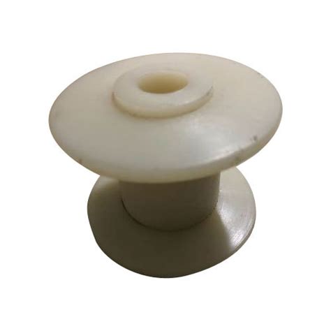 white plastic bobbin  piece  surat id