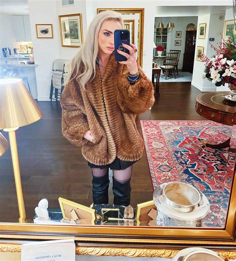 Tiffany Marie Brannon | Just a girl in her fur coat in her living room