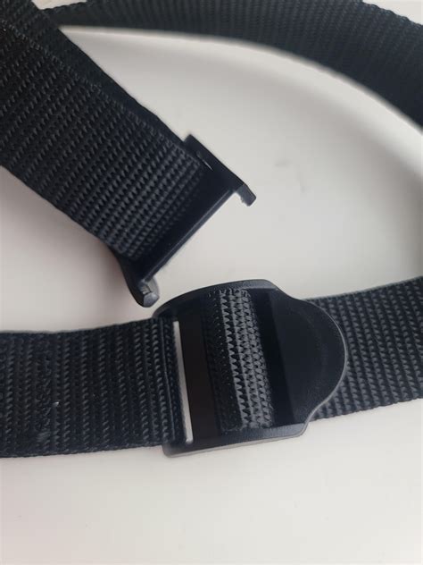 Replace a broken ladder lock slider when the nylon strap it was