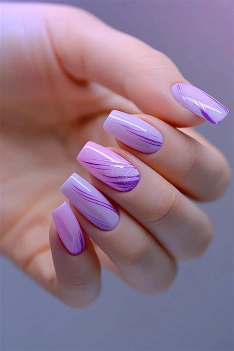 nail art with purple and white