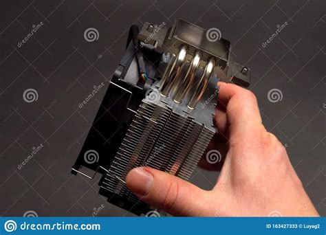 CPU Cooling System. Cooler with a Radiator in the Hands of Man Stock ...