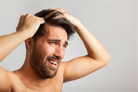 Free Photo | Man suffering from stinging head