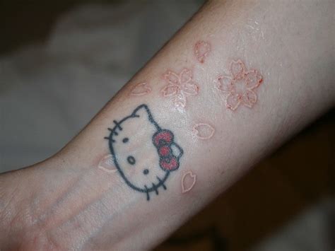white ink sakura tattoo   osaka japan  pic  flickr