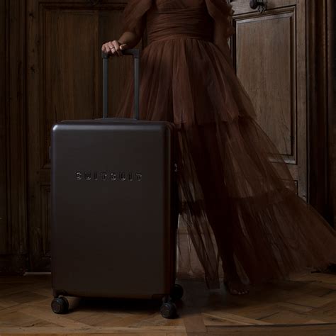 Mystique - Ground Coffee - Check-in (76 cm) – SUITSUIT International