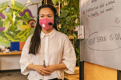 Woman in Face Mask and Headset on Teaching Class · Free Stock Photo