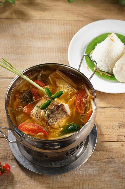 Premium Photo | Ikan kuah asam or sour fish soup