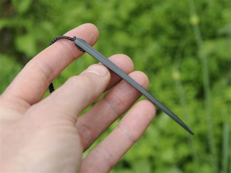 Dark Pounamu Drop — A Carved Piece