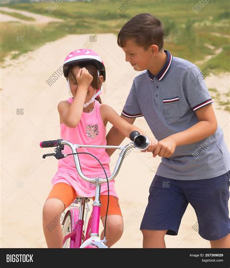 Youth Brother Teaching Image & Photo (Free Trial) | Bigstock