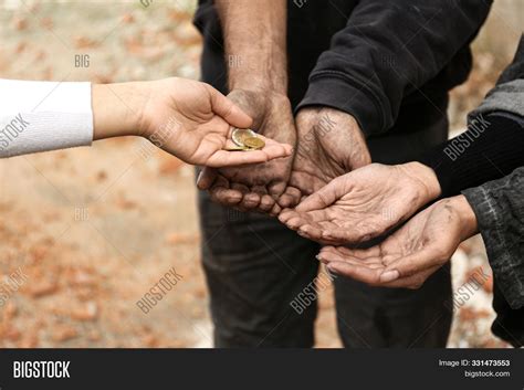 people giving money   poor