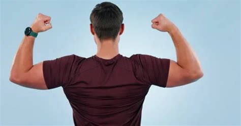 flexing biceps   bodybuilder ma stock video pond