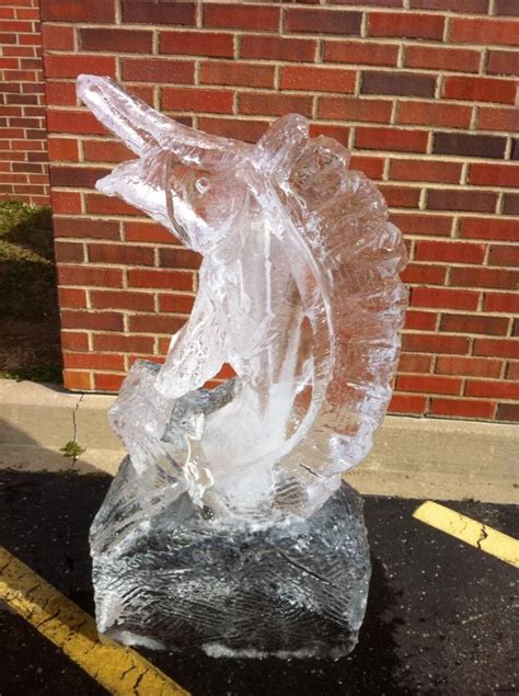 ice sculpture carved from 300 lb. block of ice with chain saw | Ice ...