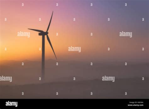 wind turbine silhouette at the sunset Stock Photo - Alamy