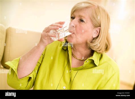 THIRSTY ELDERLY PERSON Stock Photo - Alamy