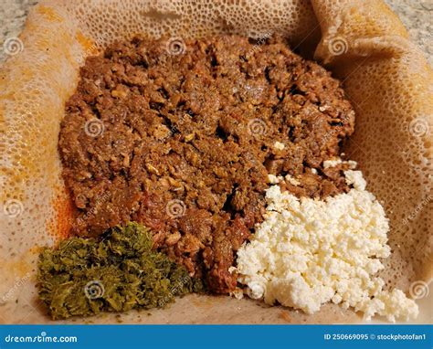 Raw Beef Ethiopian Food Called Kitfo with Bread and Greens and Cheese ...