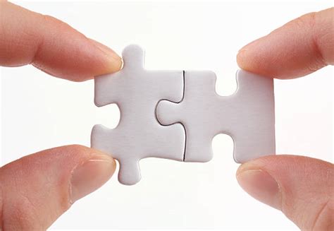 Puzzle Pieces Coming Together Pictures, Images and Stock Photos - iStock